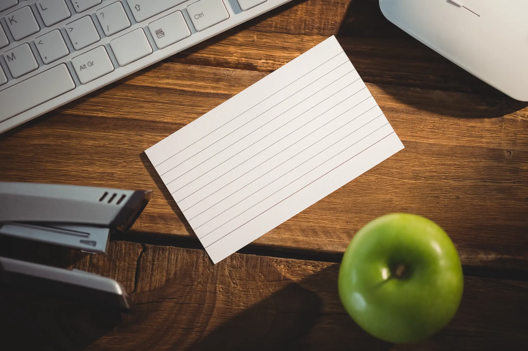 A blank note card on a desk ready for study notes